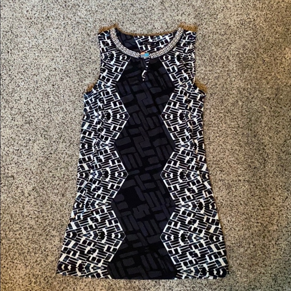 Sleeveless Dress with Decorative Neckline